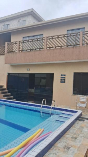 Casa com piscina perto da praia